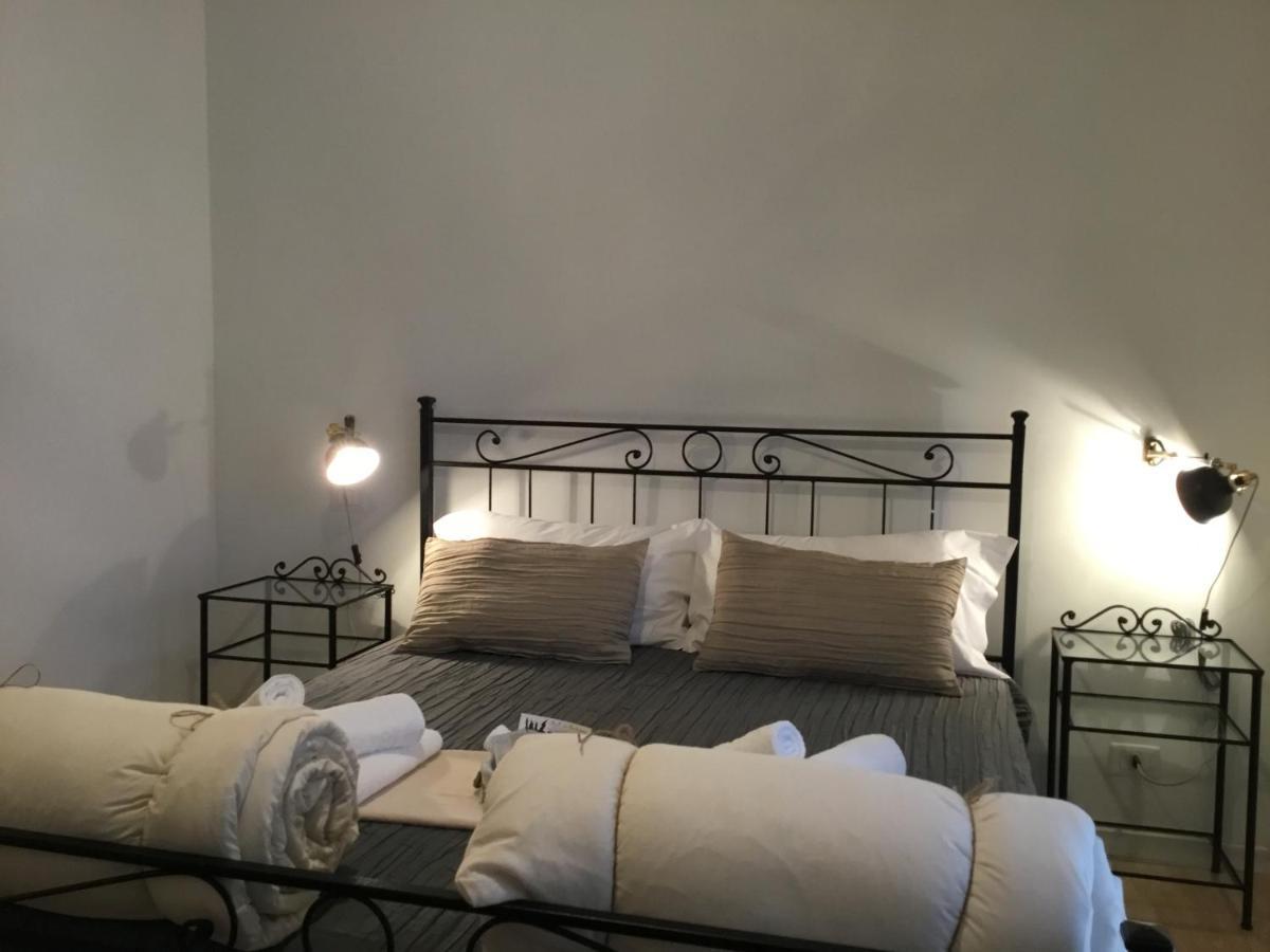 Le Fate Suites Róma Szoba fotó